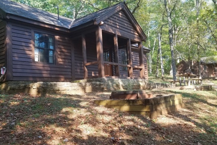 a tree in front of a house