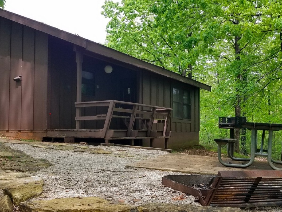 a wooden bench in front of a house