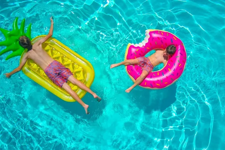 a person swimming in a pool of water